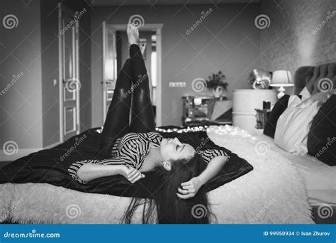 Woman Bed Seductive Pose Stock Photos, Images & Pictures